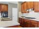 Beautiful kitchen with quartz countertops, stainless steel appliances, and custom cabinets at 5017 Bella Vista Dr, Longmont, CO 80503
