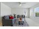 Cozy living room features neutral colors, plush seating, and lots of natural light at 5017 Bella Vista Dr, Longmont, CO 80503
