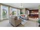 Inviting living room with lots of natural light showcasing the connection to the kitchen at 5017 Bella Vista Dr, Longmont, CO 80503