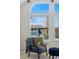 Bedroom accent chair with exterior views from the large bright windows at 5017 Bella Vista Dr, Longmont, CO 80503