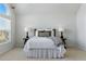 Bedroom with ample natural light, neutral tones, and comfortable furnishings at 5017 Bella Vista Dr, Longmont, CO 80503