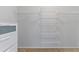 Spacious walk-in closet with carpet and multiple wire racks for optimal storage and organization at 5017 Bella Vista Dr, Longmont, CO 80503