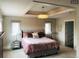 Serene bedroom featuring a large bed, neutral tones, and stylish lighting for a peaceful retreat at 4428 Perry St, Denver, CO 80212