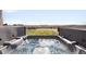 Inviting hot tub with relaxing views of the open fields and neighborhood in a tranquil setting at 720 Remington Dr, Hudson, CO 80642