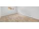 This carpeted bedroom features neutral colors, baseboard heaters and light gray paint at 387 Tucson St, Aurora, CO 80011