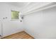 Walk-in closet with ample shelving and natural light at 387 Tucson St, Aurora, CO 80011