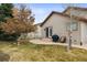 Backyard featuring a cozy patio perfect for relaxation and outdoor dining at 4143 Eagle Ridge Way, Castle Rock, CO 80104