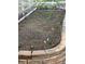 Spacious raised garden bed bordered by stone bricks, complete with rich soil and delicate seedlings at 4143 Eagle Ridge Way, Castle Rock, CO 80104