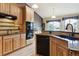 Beautiful kitchen featuring custom cabinets and stainless steel sink at 4143 Eagle Ridge Way, Castle Rock, CO 80104