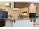 Well-equipped kitchen with granite countertops and sleek black appliances at 4143 Eagle Ridge Way, Castle Rock, CO 80104