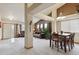 Spacious living room and dining area featuring ample lighting and modern decor at 4143 Eagle Ridge Way, Castle Rock, CO 80104