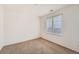 Simple bedroom with neutral walls, carpet, and a window at 20351 E Lasalle Pl, Aurora, CO 80013