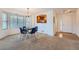 Dining area with a chandelier and a view into the kitchen at 20351 E Lasalle Pl, Aurora, CO 80013