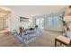 Living room with a sliding door to patio, featuring a cozy sitting area at 20351 E Lasalle Pl, Aurora, CO 80013