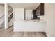 Bright kitchen featuring stainless steel appliances and a breakfast bar at 6562 Arbor Blvd # 3, Thornton, CO 80602