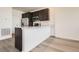 Bright kitchen featuring stainless steel appliances and a breakfast bar at 6562 Arbor Blvd # 3, Thornton, CO 80602