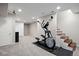 Finished basement offers versatile space with carpeting and neutral walls, great for recreation or fitness at 1343 Valentia St, Denver, CO 80220