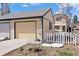Spacious garage with neutral color scheme, great storage, and convenient access to the property at 1343 Valentia St, Denver, CO 80220
