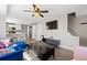Inviting living room showcases an open floor plan, modern lighting, and stylish furnishings at 1343 Valentia St, Denver, CO 80220
