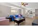 Inviting living area seamlessly flows into the kitchen, creating an open and sociable living space at 1343 Valentia St, Denver, CO 80220