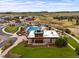 Community clubhouse, swimming pool, playground, and walking paths in the neighborhood at 14102 Night Owl Ln, Parker, CO 80134