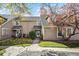 Charming townhome with mature landscaping and a welcoming entryway at 1995 S Xanadu Way, Aurora, CO 80014