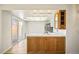 Functional kitchen with ample counter space and sliding door access to patio at 1995 S Xanadu Way, Aurora, CO 80014