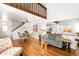 Bright living room with hardwood floors and vaulted ceilings at 1995 S Xanadu Way, Aurora, CO 80014