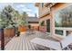 Relaxing outdoor deck with seating and a sun lounger, perfect for enjoying the backyard and sunshine at 8101 E Dartmouth Ave # 22, Denver, CO 80231
