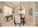 Inviting dining room featuring a chandelier and neutral decor, perfect for Gathering meals and gatherings at 8101 E Dartmouth Ave # 22, Denver, CO 80231