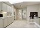 Hallway includes built-in cabinets and a skylight offering an abundance of storage at 8101 E Dartmouth Ave # 22, Denver, CO 80231