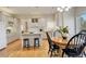 Well-lit kitchen with granite countertops, stainless steel appliances, and an island with barstool seating at 8101 E Dartmouth Ave # 22, Denver, CO 80231