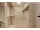 Spacious walk-in closet with shelving and ample storage, offering convenient organization at 8101 E Dartmouth Ave # 22, Denver, CO 80231