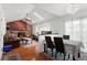 Inviting dining room featuring hardwood floors, skylights, and elegant decor at 18982 E 46Th Ave, Denver, CO 80249