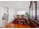 Charming dining room with hardwood floors and elegant furnishings at 18982 E 46Th Ave, Denver, CO 80249
