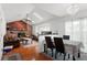 Inviting living room features a wood-burning fireplace and bright skylights at 18982 E 46Th Ave, Denver, CO 80249