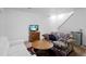 Inviting living room with a white couch, floral sofa, tv and a wooden coffee table at 18982 E 46Th Ave, Denver, CO 80249