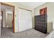 Bedroom with double door closet and carpet flooring at 5780 Raleigh Cir, Castle Rock, CO 80104