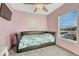 Bedroom with a daybed and window with a view at 5780 Raleigh Cir, Castle Rock, CO 80104