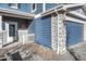 Front entrance with stone accents and a glass door at 5780 Raleigh Cir, Castle Rock, CO 80104
