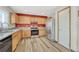 Kitchen features granite countertops, wood cabinets, and stainless steel appliances at 5780 Raleigh Cir, Castle Rock, CO 80104