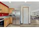 Kitchen features granite countertops, wood cabinets, and stainless steel appliances at 5780 Raleigh Cir, Castle Rock, CO 80104
