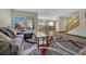 Spacious living room with hardwood floors and a cozy sectional sofa at 5780 Raleigh Cir, Castle Rock, CO 80104