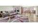 Open concept living room and dining area with hardwood floors at 5780 Raleigh Cir, Castle Rock, CO 80104
