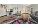 Living room with hardwood floors, fireplace, and comfy seating at 5780 Raleigh Cir, Castle Rock, CO 80104