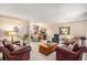 Bright living room with a view into the dining area at 3317 S Elkhart St, Aurora, CO 80014