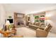 Living room with a brick fireplace and comfy seating at 3317 S Elkhart St, Aurora, CO 80014
