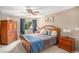Spacious main bedroom with ceiling fan and ample closet space at 3317 S Elkhart St, Aurora, CO 80014