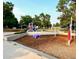 playground with play structures and wood chips at 3317 S Elkhart St, Aurora, CO 80014