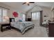 Calm bedroom featuring neutral colors, vaulted ceilings, and large windows at 23500 Bent Oaks Way, Parker, CO 80138